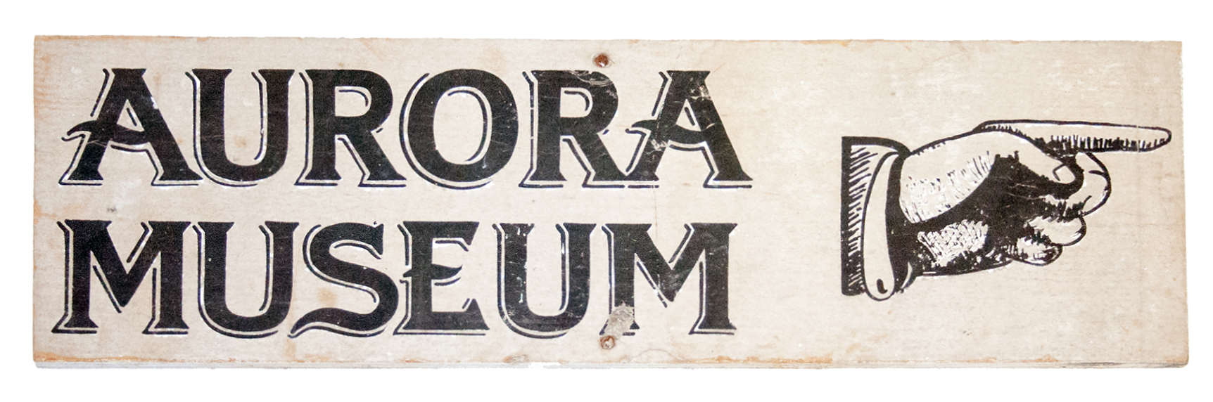 A wooden sign for the Aurora Museum, with a painted pointing hand.