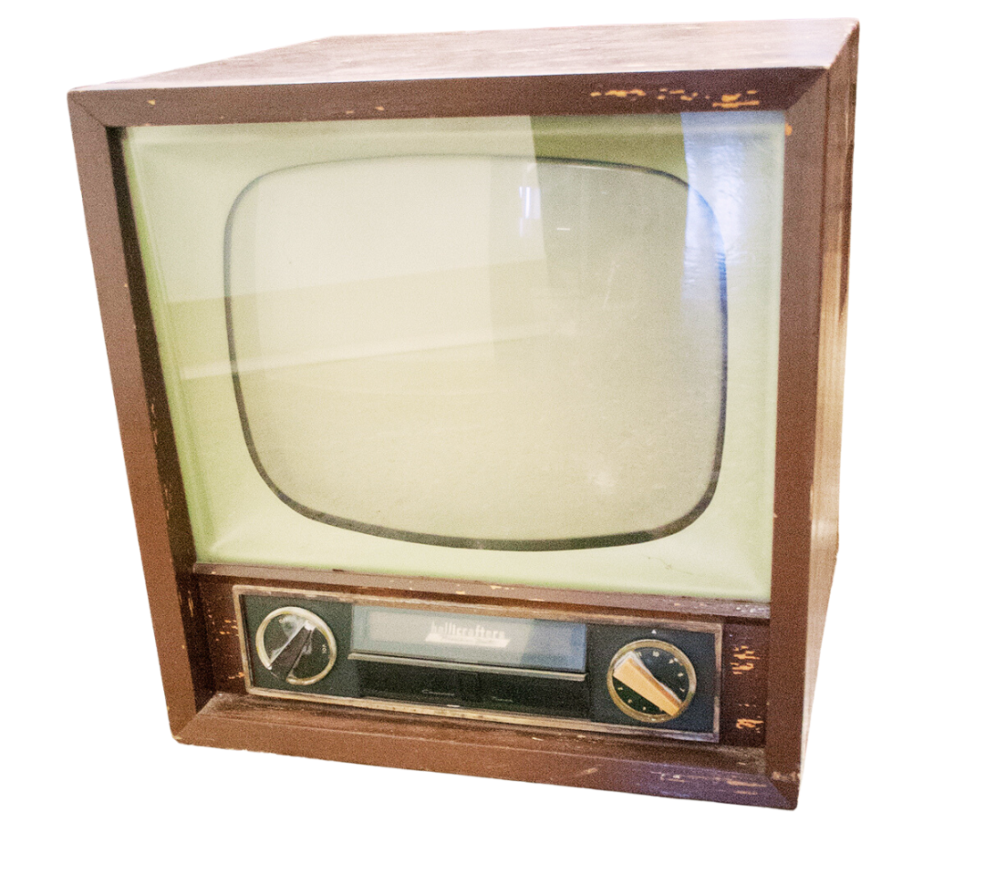 A colour photo of a 1955 television set. 
