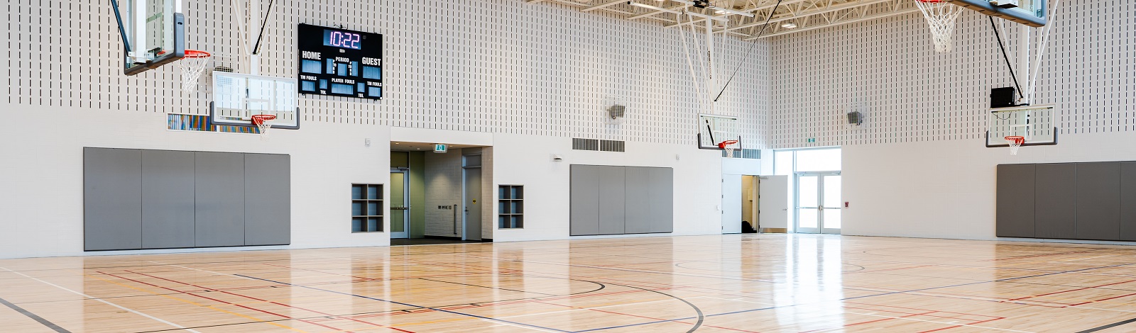 Image of the SARC gymnasium floor, walls and basketball nets