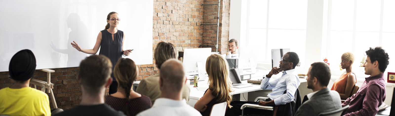 Group of people attending workshop education session