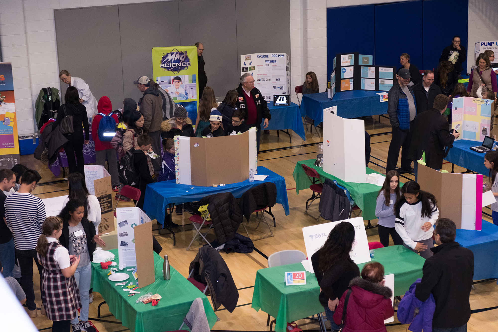 Overhead photo of youth during innovation fair
