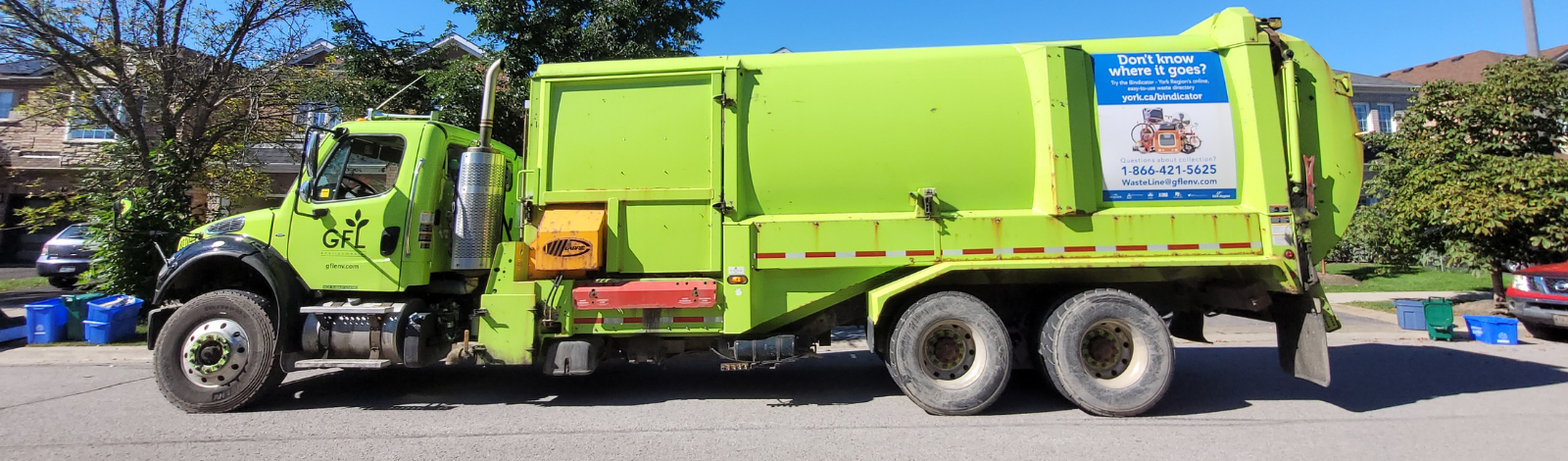 Garbage Truck with words Right Hand Drive Caution, Vehicle stops and back frequently