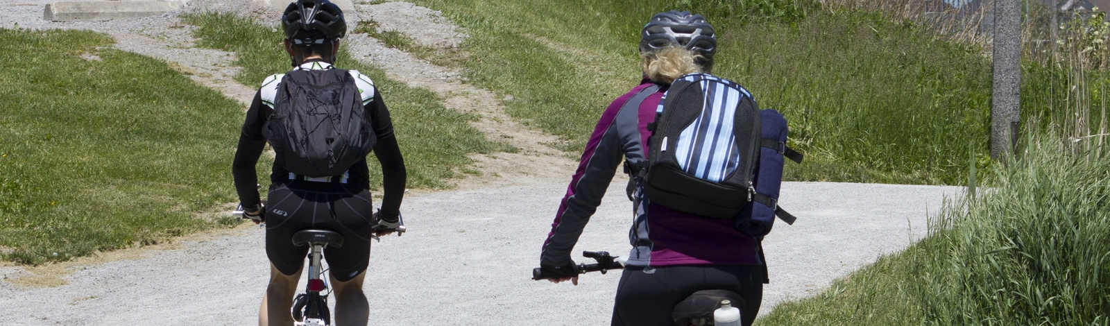 Two people biking