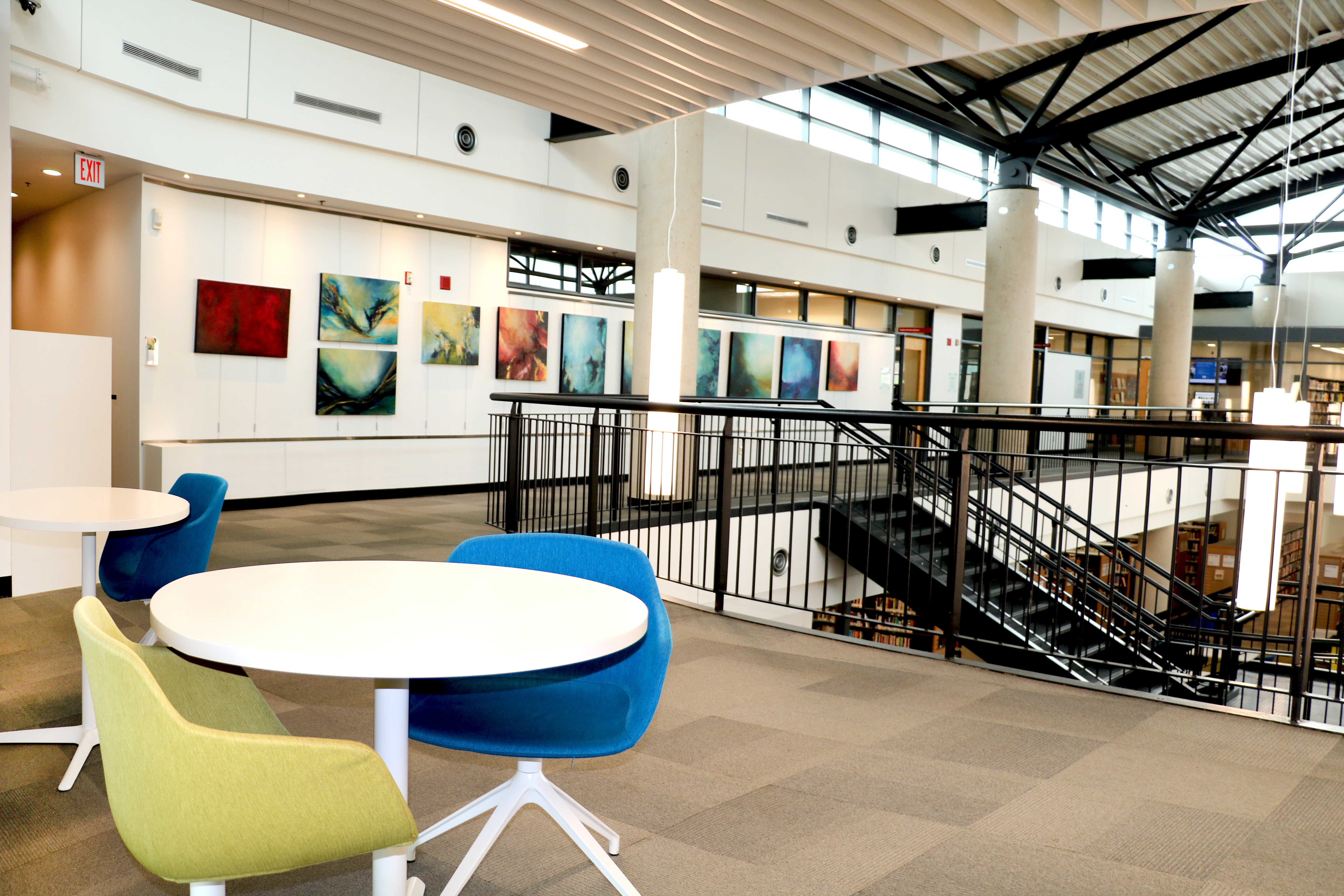 Cozy seating and bookshelves at Aurora Public Library