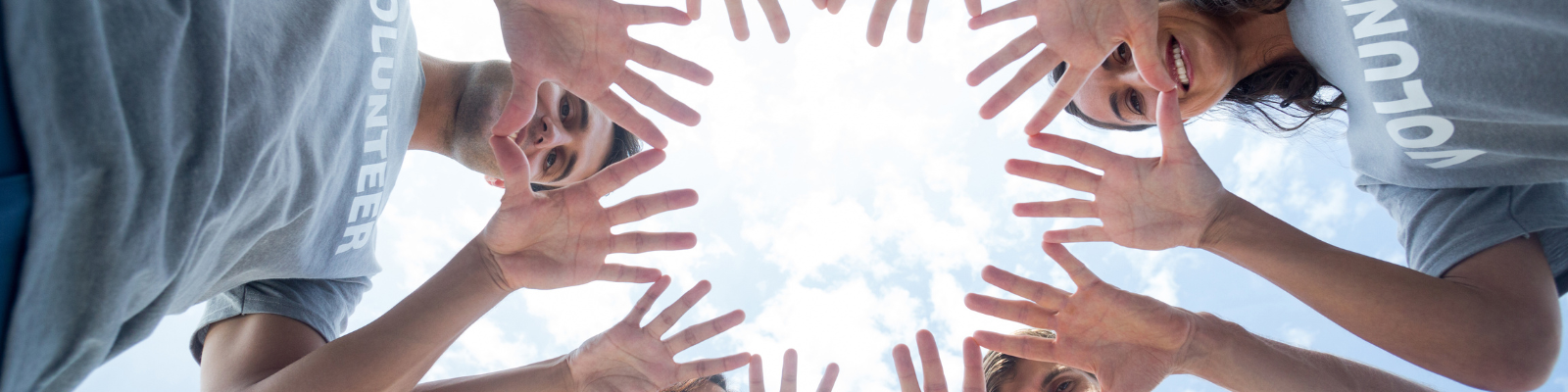 A circle of hands coming together
