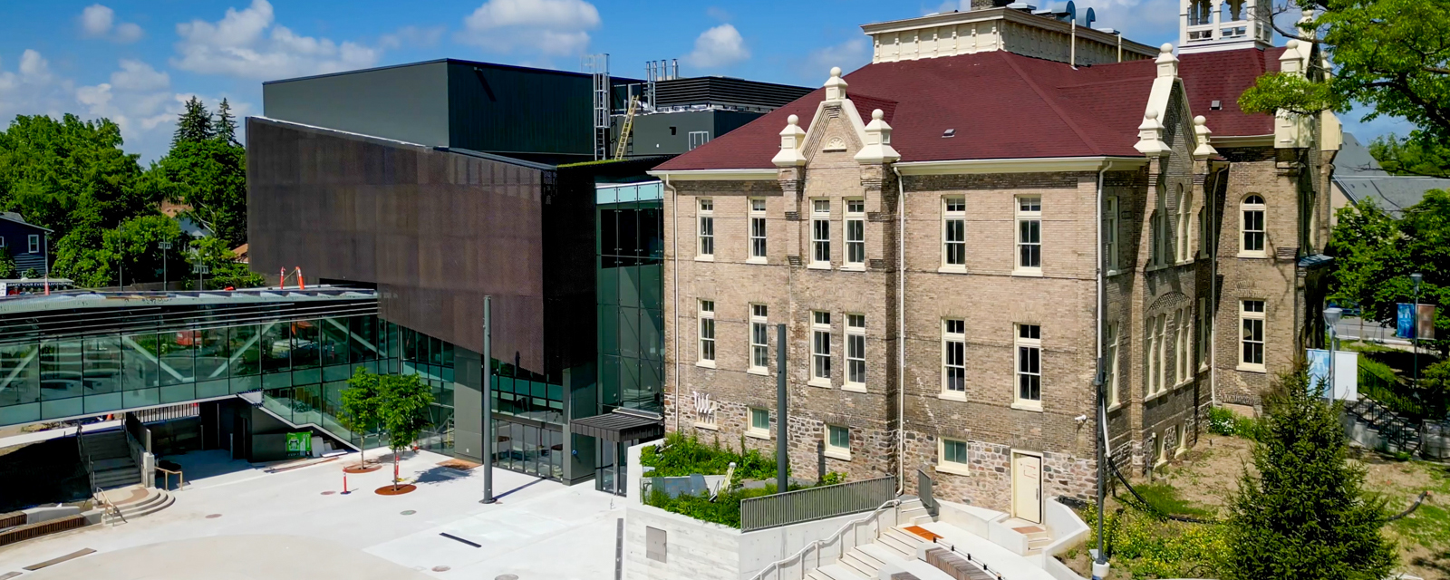 External view of Town Square, showing the bridge, performance centre and school