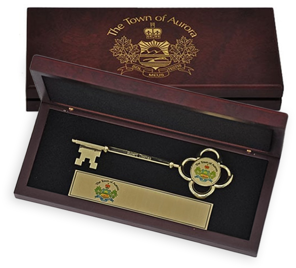 Town key inside branded wood box, with the name The Town of Aurora
