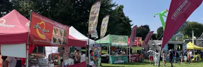 Wide view of food vendors and ribfest event
