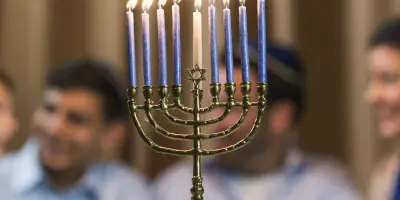 Menorah candle holder on table