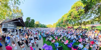 View of people at outdoor summer concert