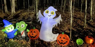 Halloween themed inflatables in park at night