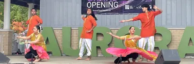 Multicultural dancers on stage at event