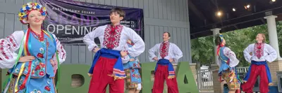 Multicultural dancers on stage at event