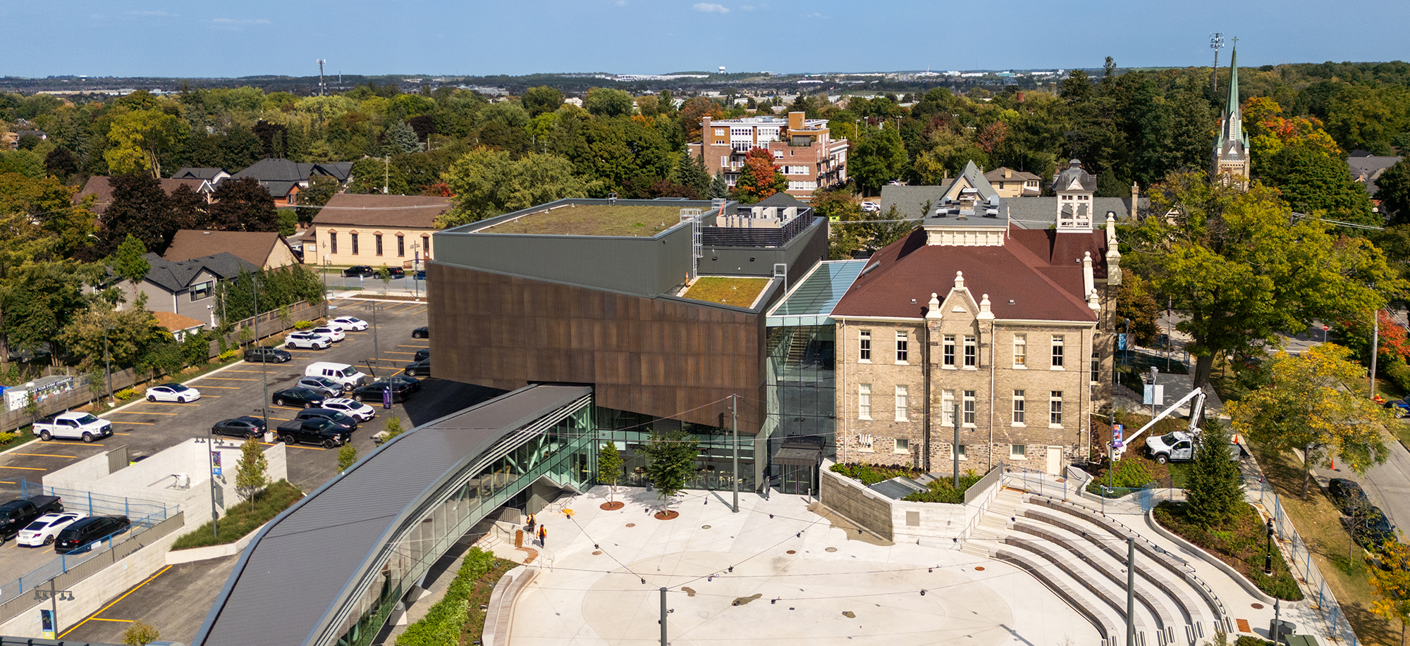 Aerial view of Aurora Town Square, showing outdoor space, performance centre and the old school