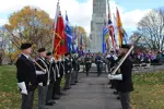 Remembrance Day Procession and military staff standing at attention