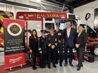 Central York Fire Services senior leadership team and Mayor, standing in front of red vehicle