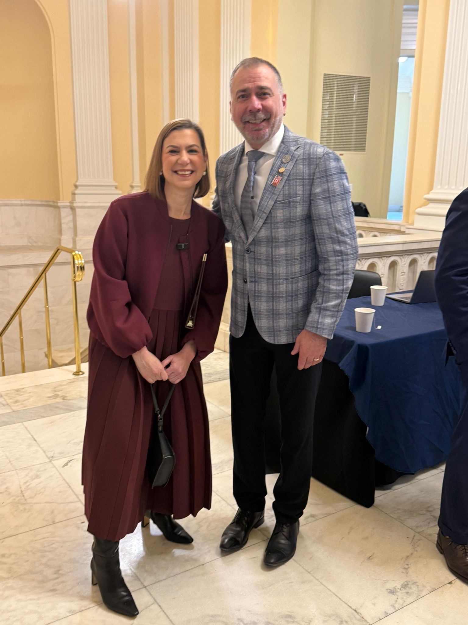 Mayor posing for a picture beside another person