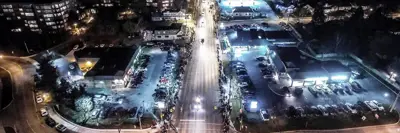 Aerial view of Yonge Street in Aurora during night time Santa parade event